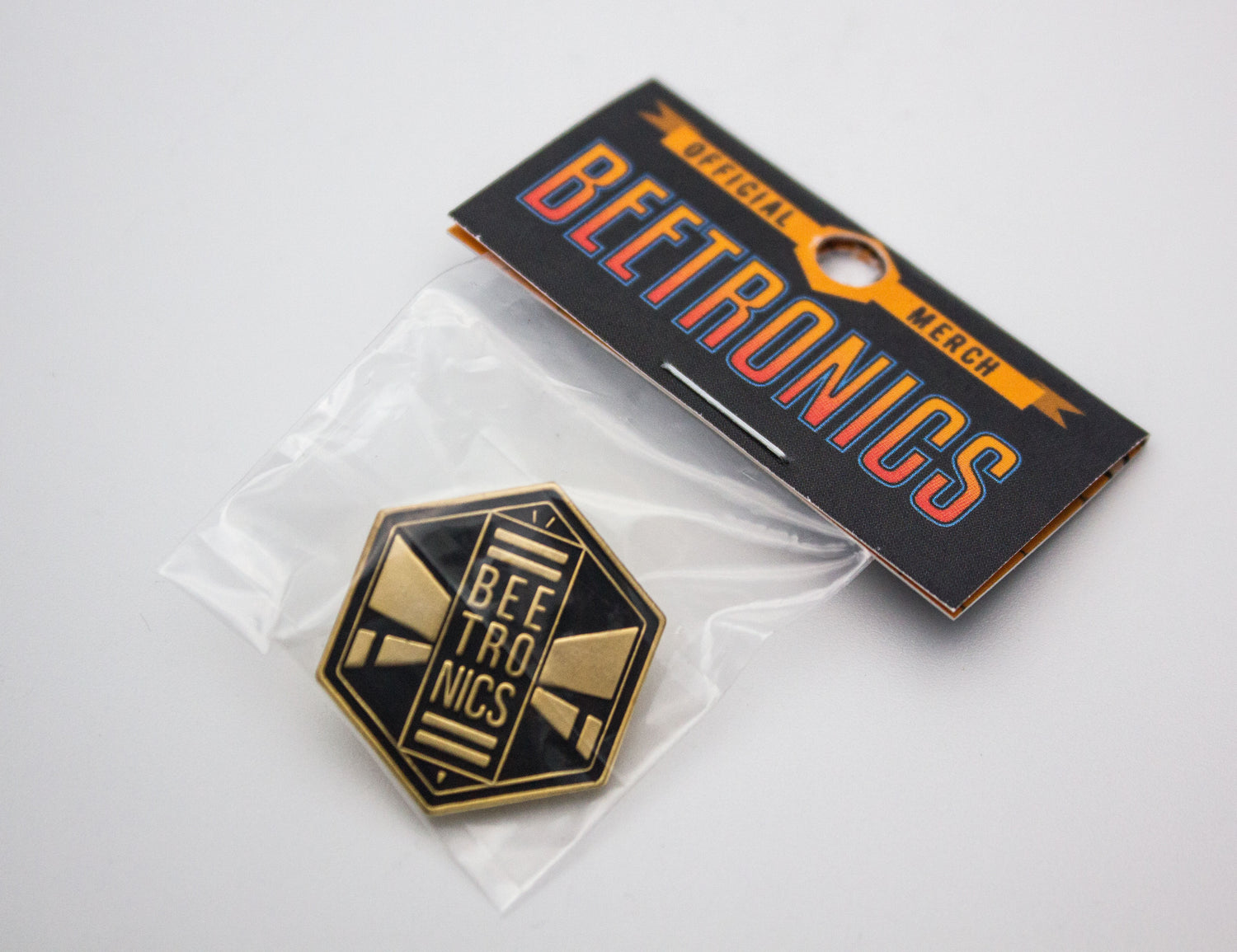 Gold Logo Enamel Pin