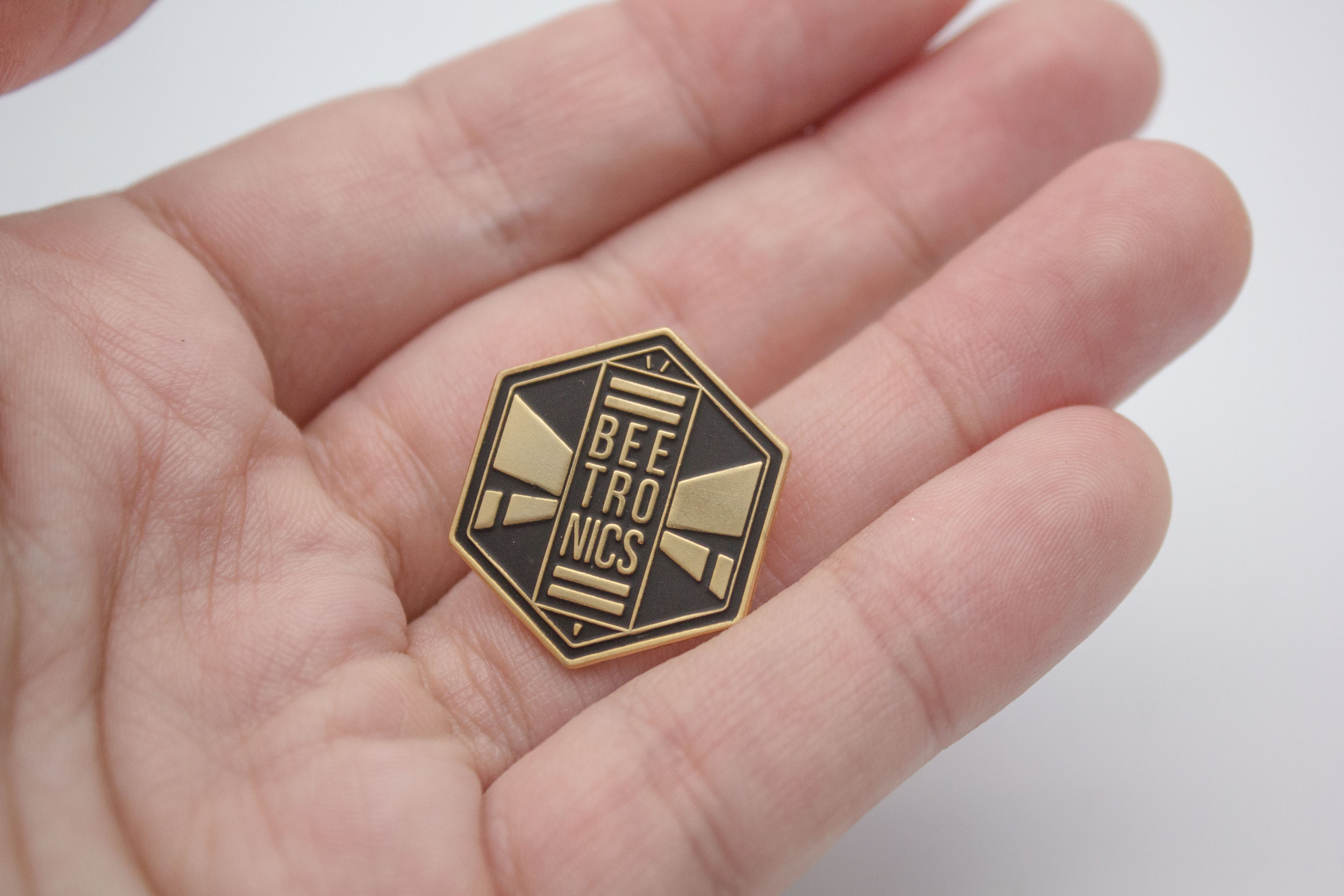 Gold Logo Enamel Pin